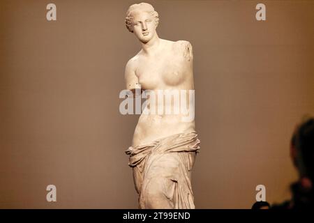 Venus de Milo ancient Greek sculpture in the Louvre Museum in Paris, France. Stock Photo