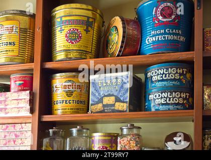Shelves with vintage metal cannisters for Canadian cookies, biscuits and confections. Stock Photo