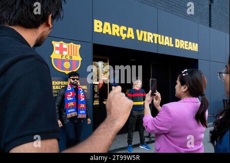 Barcelona, Spain. 21st Nov, 2023. People take photos while visiting Barcelona's football stadium facility, Spotify Camp Nou, and its official merchandise store and museum as the stadium is currently under construction and remodeling in Barcelona. If everything goes as planned and budgeted, the new stadium design will be completely renovated and fully operational by the end of the 2025-26 season. Credit: SOPA Images Limited/Alamy Live News Stock Photo