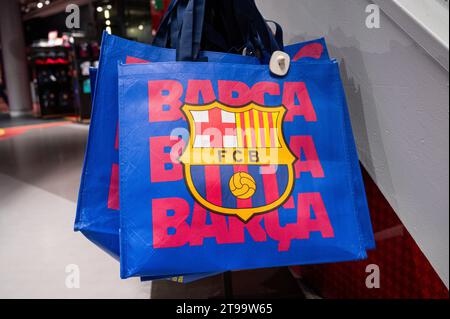 Barcelona, Spain. 21st Nov, 2023. Barcelona football team shopping bags are seen at its football stadium facility, Spotify Camp Nou, and its official merchandise store in Barcelona. Credit: SOPA Images Limited/Alamy Live News Stock Photo