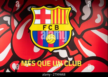 Barcelona, Spain. 21st Nov, 2023. Barcelona football team insignia with The Rolling Stones band theme background seen at its football stadium facility, Spotify Camp Nou, inside its official merchandise store in Barcelona. Credit: SOPA Images Limited/Alamy Live News Stock Photo