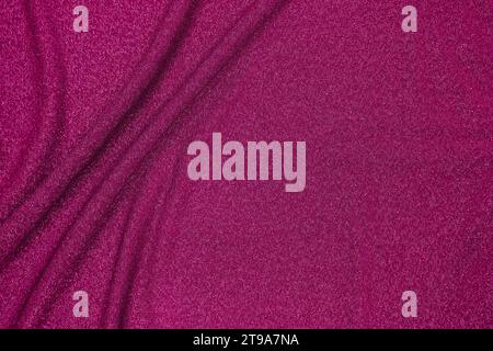 Background of draped saturated pink fabric with silver lurex thread Stock Photo