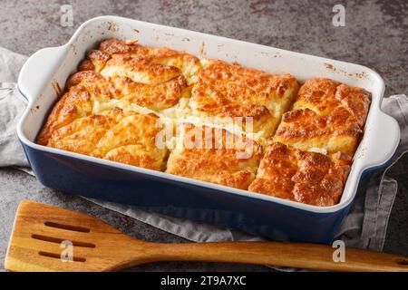 Butter swim biscuits are biscuits baked in pan of melted butter closeup on the table. Horizontal Stock Photo