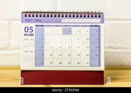 Desk calendar for May 2024 on the table Stock Photo