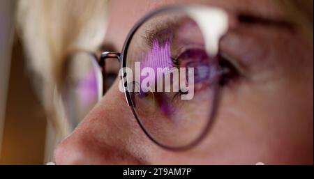 Business Woman Analyst Monitoring KPI Data with Technology Dashboard Stock Photo