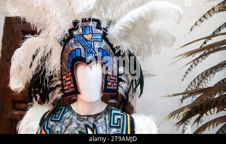 A Aztec Mexican dancer headdress with exotic bird feathers and traditional sewing decorations Stock Photo