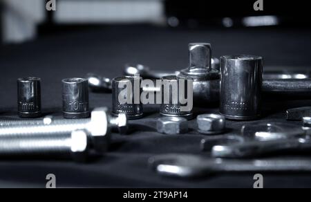 Variety Hardware Products On Black Workbench Closeup Angle View Stock Photo