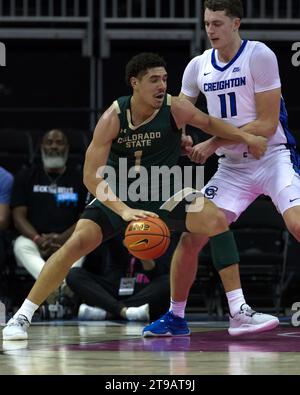 Kansas City, Missouri, USA. 24th Nov, 2023. Colorado State Rams forward JOEL SCOTT #1 (l) is on the offense against Creighton Bluejays center RYAN KALKBRENNER #11 (r) during the first half of the Championship match at the 2023 CBE Hall of Fame Classic. (Credit Image: © Serena S.Y. Hsu/ZUMA Press Wire) EDITORIAL USAGE ONLY! Not for Commercial USAGE! Stock Photo