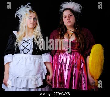 Portrait of two women dressed as  comic book charactesr. at a comic book convention in New York City. Stock Photo