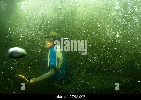 Man squirt boating underwater Stock Photo - Alamy