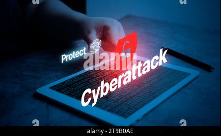 Woman use digital tablet to protect system from cyberattack. Cyber crime concept and selective focus. Biometric identification against cyberattacks. Stock Photo
