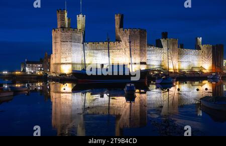 Caernarfon Castle on the river Seiont in Gwynedd, North Wales. Image taken in October 2023. Stock Photo