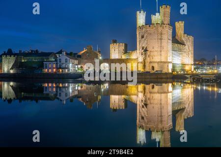 Caernarfon Castle on the river Seiont in Gwynedd, North Wales. Image taken in October 2023. Stock Photo