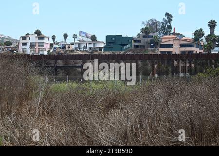 San Ysidro, CA, USA - July 30, 2023: The USA Mexico Border Wall near Border Field State Park Beach. Stock Photo