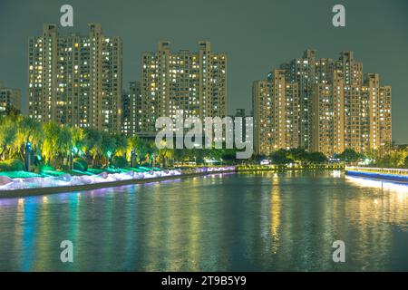 night view along suzhouhe river, buildings against sky Stock Photo