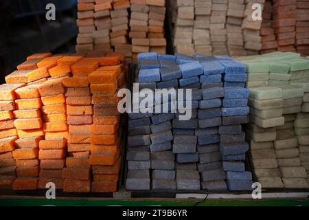 Stunning view of a pile of solid perfumes in Marrakesh's souk, Morocco. Colorful handmade solid perfume tablets. Stock Photo