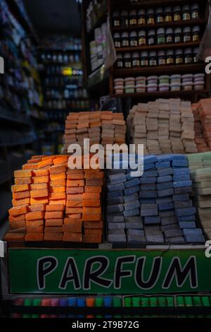 Stunning view of a pile of solid perfumes in Marrakesh's souk, Morocco. Colorful handmade solid perfume tablets. Stock Photo