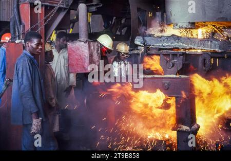 Tanzania,Dar es Salaam -  Recycled metal iis melted n a steel factory from Aluminium Africa company. Stock Photo