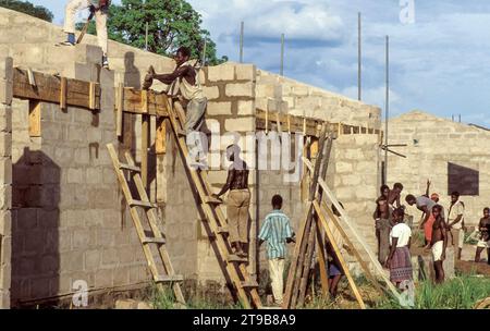 Tanzania, Kilombero; People are constructing new houses with bricks. Stock Photo