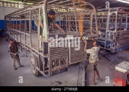 Tanzania, Dar-es-Salaam, men are working in a truck assembly factory. Stock Photo