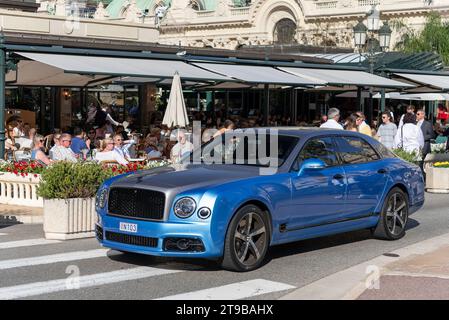 Monaco, Monaco - Blue and grey Bentley Mulsanne Speed Mulliner Design Series driving on the on Casino Square. Stock Photo