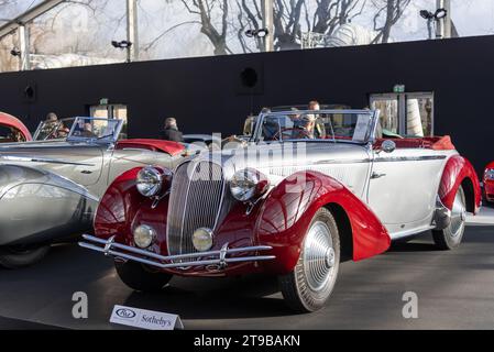 Paris, France - RM Sotheby's Paris 2020. Focus on a red and silver 1946 Delahaye 135 Cabriolet by Figoni et Falaschi. Chassis no. 800308. Stock Photo
