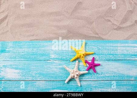 Sand copy space. Sand background top view. starfish on wooden background Stock Photo