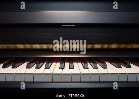 Piano keys. Straight on shot, front view, close up, no people. Stock Photo