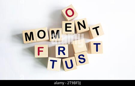 Moment of truth text on wooden blocks and light background Stock Photo