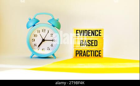Evidence based practice text concept on wooden blocks. Beautiful background, Business concept. Stock Photo