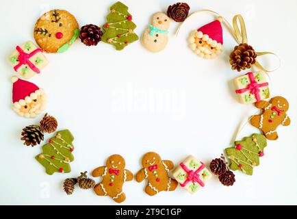 Stunning Picture Frame of Assorted Christmas Cookies on White Background with Copy Space Stock Photo