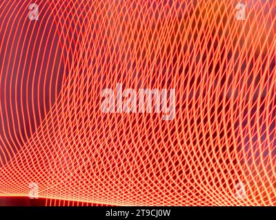Abstract lines background. Abstract lines texture. Red and orange colors. Stock Photo