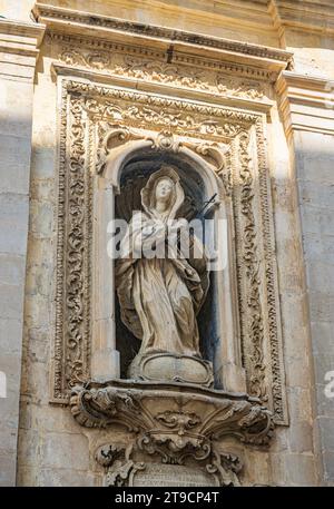 Galatina, Lecce, Puglia, Italy. Ancient village in Salento. The ancient Church of the Madonna dell'Addolorata in baroque style, with the statue of the Stock Photo
