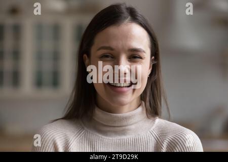 Head shot portrait beautiful young woman smile look at camera Stock Photo