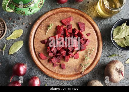 Sliced beetroot on a wooden cutting board, top view Stock Photo