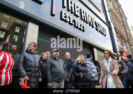 London, UK. 24th Nov, 2023. Music lovers seen outside the new HMV store on London's Oxford Street which reopens following a four-year absence. The music chain store closed its London branch in 2019 after going into administration. Credit: SOPA Images Limited/Alamy Live News Stock Photo