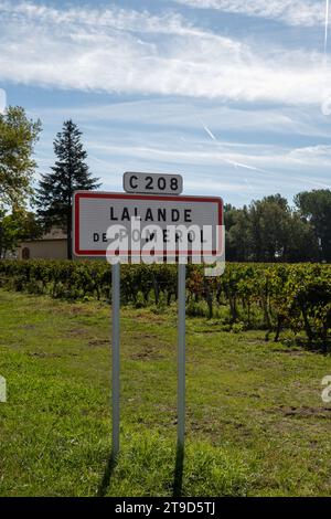 City road sign Lalande de Pomerol near Saint-Emilion wine making region, growing of Merlot or Cabernet Sauvignon red wine grapes, France, Bordeaux in Stock Photo