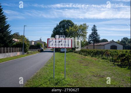 City road sign Lalande de Pomerol near Saint-Emilion wine making region, growing of Merlot or Cabernet Sauvignon red wine grapes, France, Bordeaux in Stock Photo