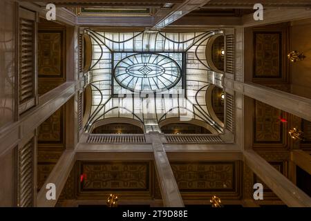 The Book Tower in downtown Detroit, Michigan, United States, features an ornate glass dome spanning the three-storey atrium, made of around 6,000 glass panels and 7,000 jewel-like inlays. The rotunda, along with 29 restored caryatid figures, was part of a seven-year renovation of the 1926 high-rise carried out by the real-estate company Bedrock, which had bought the building in 2015. Stock Photo