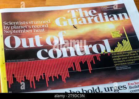 6 Oct 2023. Front page of Guardian headline reads Out of control, referring to rising temperatures. Stock Photo