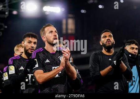 Cologne, Germany. 24th Nov, 2023. COLOGNE, GERMANY - NOVEMBER 24: Noussair Mazraoui of FC Bayern Munchen, Harry Kane of FC Bayern Munchen and Eric Maxim Choupo-Moting of FC Bayern Munchen celebrate their team's win during the Bundesliga match between 1. FC Koln and FC Bayern Munchen at the RheinEnergieStadion on November 24, 2023 in Cologne, Germany. (Photo by Rene Nijhuis/BSR Agency) Credit: BSR Agency/Alamy Live News Stock Photo