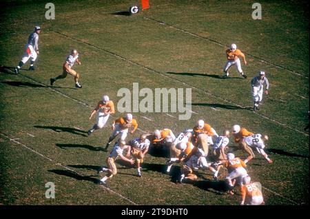 ATLANTA, GA - OCTOBER 11:  Ronnie Lewis #30 of the Georgia Tech Yellow Jackets gets the hand off from quarterback Fred Braselton #11 during an NCAA game against the Tennessee Volunteers on October 11, 1958 at Grant Field in Atlanta, Georgia.  (Photo by Hy Peskin) *** Local Caption *** Ronnie Lewis;Fred Braselton Stock Photo