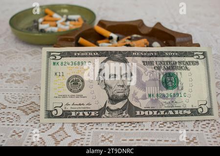 the dangerous and expensive habit of smoking, it is an addiction Stock Photo