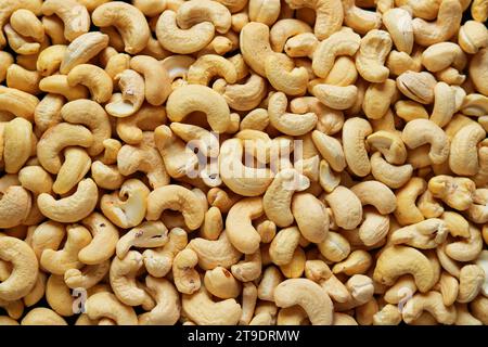 Roasted cashew nuts background. Top view of cashew nuts. Stock Photo