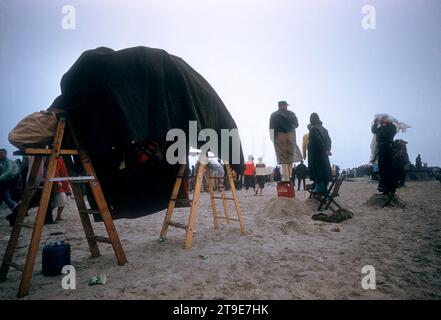 DAYTONA BEACH, FL - FEBRUARY 26: General view as fans stand on the sand during the Daytona Beach and Road Course on February 26, 1956 in Daytona Beach, Florida. (Photo by Hy Peskin) Stock Photo