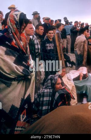 DAYTONA BEACH, FL - FEBRUARY 26: General view as fans are bundled up during the Daytona Beach and Road Course on February 26, 1956 in Daytona Beach, Florida. (Photo by Hy Peskin) Stock Photo