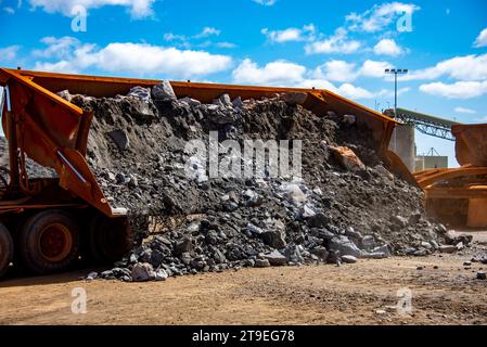 Truck Dumping Ore from Mine Stock Photo