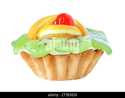 Cake tartlet with kiwi, oranges and cherry, side view,  isolated on white background with clipping path. Stock Photo