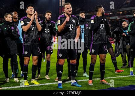 Cologne, Germany. 24th Nov, 2023. COLOGNE, GERMANY - NOVEMBER 24: Raphael Guerreiro of FC Bayern Munchen, Mathys Tel of FC Bayern Munchen, Noussair Mazraoui of FC Bayern Munchen, Harry Kane of FC Bayern Munchen, Aleksandar Pavlovic of FC Bayern Munchen and Eric Maxim Choupo-Moting of FC Bayern Munchen celebrate their team's win during the Bundesliga match between 1. FC Koln and FC Bayern Munchen at the RheinEnergieStadion on November 24, 2023 in Cologne, Germany. (Photo by Rene Nijhuis/BSR Agency) Credit: BSR Agency/Alamy Live News Stock Photo
