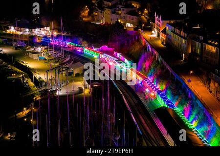 Kingswear, Devon, UK.  24th November 2023.  The Christmas Train of Lights on the Dartmouth Steam Railway in Devon, which runs between 24th November to 30th December 2023, is at Kingswear in Devon before departing for Paignton.  The carriages and steam locomotives on the festive service are lit inside and out with coloured lights.  Picture Credit: Graham Hunt/Alamy Live News Stock Photo